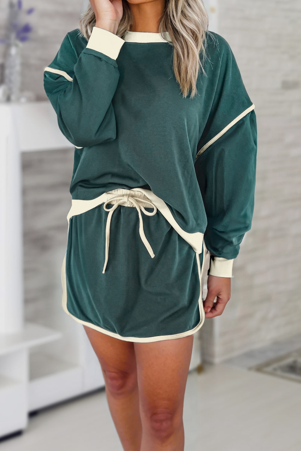 Evergreen Color Contrast Loose Pullover and Lace-up Waist Skort Set 🇨🇳