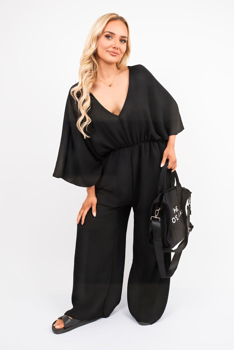 Wide Leg V Neck Jumpsuit with Back Tie Detail 🇬🇧