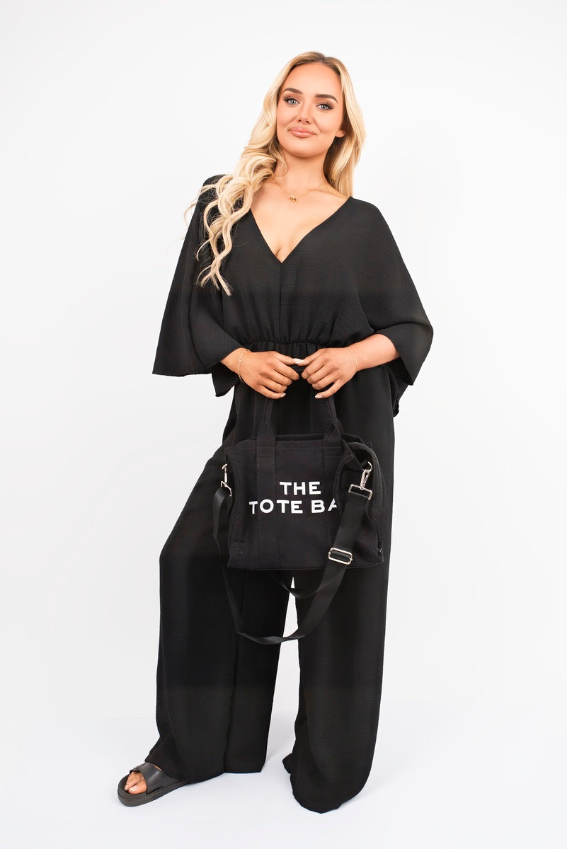 Wide Leg V Neck Jumpsuit with Back Tie Detail 🇬🇧